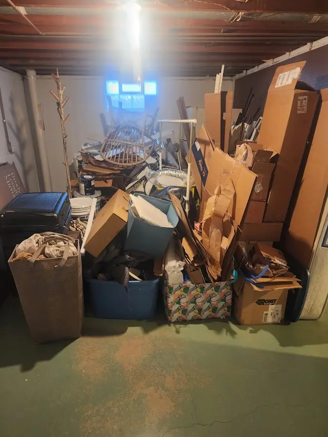 Roll-off dumpster container at job site for Construction Dumpster Rental in Wingate